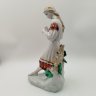 Купить Статуэтка "Любит-не-любит" (Гадание на ромашке), скульптор О.Л. Жникруп, фарфор, роспись, Полонский завод художественной керамики (Полонное ЗХК), СССР, 1973-1991 гг.