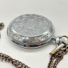 Купить Карманные часы "Молния" с ажурным растительным декором и дарственной надписью, металл, пластик, Челябинский часовой завод «Молния», СССР, 1970-1980 гг.