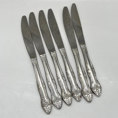 купить Набор из 6-ти столовых ножей, украшенных флоральным декором, нержавеющая сталь, Павловский завод художественных металлоизделий им. С.М. Кирова, СССР, 1973-1991 гг.