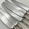 Купить Набор из 6-ти столовых ножей, украшенных растительным декором, мНЦ (медь-никель-цинк), нержавеющая сталь, Вольнянский завод столовых приборов им. Шевченко (ЗiШ, ЗиШ), СССР, 1950-1970 гг.