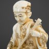 Купить Окимоно (статуэтка) "Музыкант с карако", период Тайсё, кость, резьба, тонировка, чернение, Япония, 1912-1926 гг.