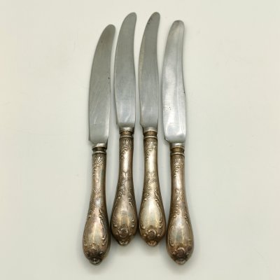 купить Набор из 4-х десертных ножей с растительным декором, мНЦ (медь-никель-цинк), нержавеющая сталь, Вольнянский завод столовых приборов им. Шевченко (ЗiШ, ЗиШ), СССР, 1960-1990 гг.