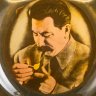 Купить Плакетка настенная с изображением И.В. Сталина, закуривающего трубку, бакелит, бумага, печать, СССР, 1970-1980 гг.
