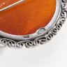 Купить Брошь винтажная круглой формы с ажурной оправой, серебро 875 пр., янтарь, Калининградский янтарный комбинат, СССР, 1960-1980 гг.