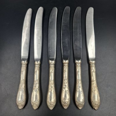 купить Набор из шести столовых ножей с растительным декором, мНЦ (медь-никель-цинк), нержавеющая сталь, Вольнянский завод столовых приборов им. Шевченко (ЗiШ, ЗиШ), СССР, 1960-1990 гг.