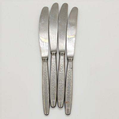 купить Набор из 4-х столовых ножей с цветочным декором на ручках, сталь, Завод «Труд» (р.п. Вача), СССР, 1980-1990 гг.