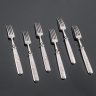 Купить Набор из шести вилок с рельефным декором на ручках, сталь, Германия, 1900-1940 гг.