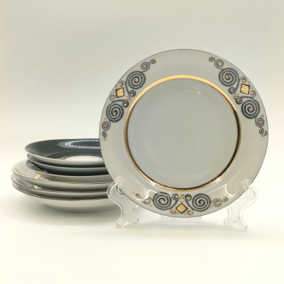 купить Набор из 3-х блюдец и 4-х пирожковых тарелок из сервиза "Марианна", автор формы Эрик Эллер, автор рисунка Беатрис Карклиня, фарфор, крытье, деколь, золочение, Рижский фарфорово-фаянсовый завод, СССР, 1970-1980 гг.